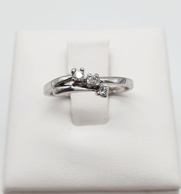 ANELLO ORO BIANCO 18K 750 3 BRILLANTI DA 0,12 CT TOTALI GR.2,74