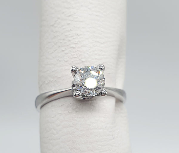 ANELLO SOLITARIO ORO BIANCO 18K 750 BRILLANTE CENTRALE 0,58 CT PUREZZA VS/H GR.3,42